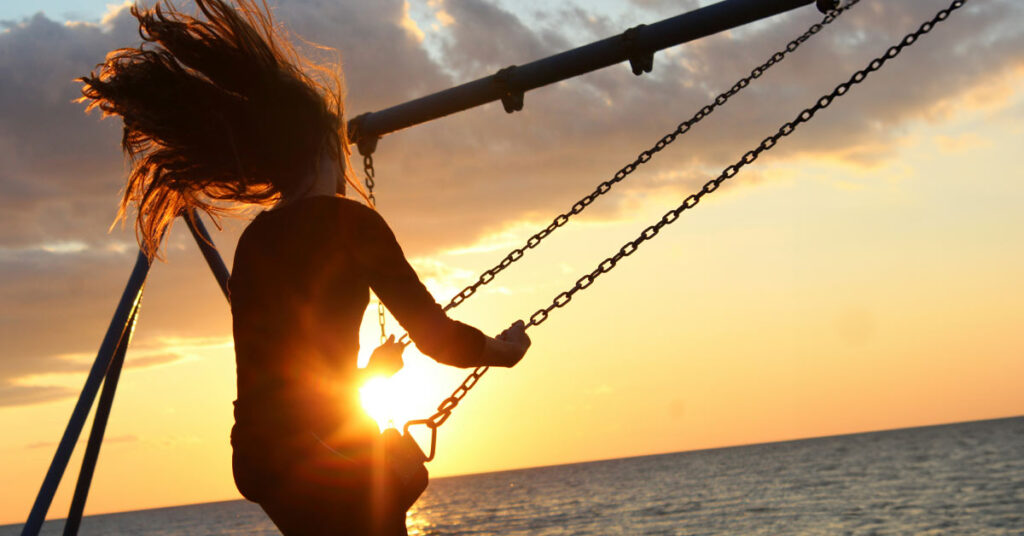 A rocking woman as a metaphor for freedom. when you get away from renting and become an owner